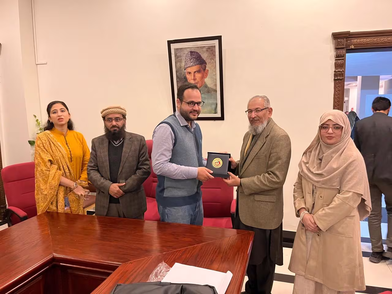 Shifa Tameer-e-Millat University - Shield Presentation